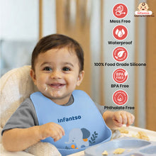 blue silicone baby bib with elephant design worn by smiling child, waterproof mess‑free BPA‑free phthalate‑free food grade silicone